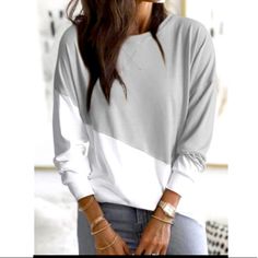 Very Pretty White And Gray Casual Shirt. Good For Every Day Where. Very Comfortable Material. Can Match With A Lot Of Things. Only 2 Size Small True To Size Shop With Confidence. Trusted Seller And Posh Ambassador. Fast Shipping. Add Your Likes To A Bundle To Save Big. I Will Always Discount And You Will Also Save On Shipping Cost. Offers Are Welcomed. Send Me A Offer!!! Long Sleeve Color Block Tops For Layering, Gray Color Block Top For Summer, Gray Color Block Summer Top, Trendy Long Sleeve Color Block Tops, Casual Oversized Gray Blouse, Trendy Oversized Color Block Top, Casual White T-shirt For Layering, Oversized Gray Casual Blouse, Casual Cotton Color Block Blouse