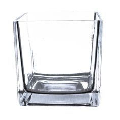 an empty glass vase on a white background