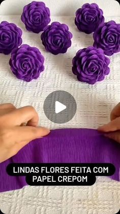 the video shows how to make paper flowers