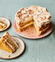 two plates with slices of cake on them and one slice has been cut from it