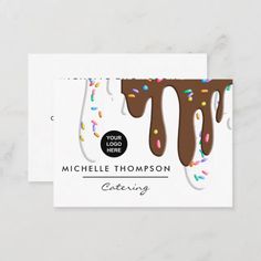 a business card with chocolate icing and sprinkles