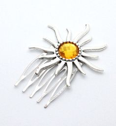 Beautiful silver sunburst hair comb. Silver tones comb made with a lovely sunburst cabochon. The comb measures 6cm in height and 4.5cm in width. The teeth of the comb measure 3cm in width. The sun is attached to the comb using strong jewellery glue. Perfect for that special occasion or everyday use. Sun Themed Accessories, Sun Moon Hair Accessories, Sun Hair Pin, Brass Sun Design Dangle Jewelry, Sun Brooch, Sun Hair, Comb Hair, Golden Sun, Hair Comb