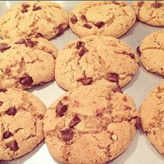 chocolate chip cookies on a baking sheet ready to be baked in the oven for consumption