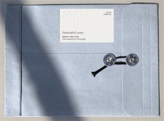 an envelope with two keys attached to it