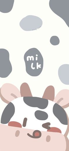 a cow with spots on it's face and the words mik above it