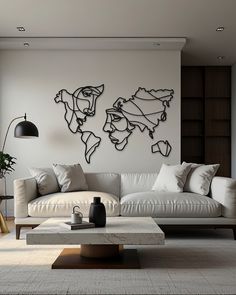 a living room filled with furniture and a large map on the wall above it's coffee table