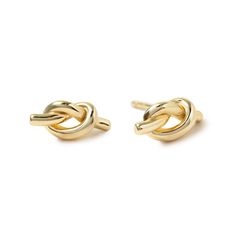 These classic Gold love knot studs are designed to represent love and unity. Great for everyday wear; worn on first or second hole piercings.Gold Vermeil Knot Specs 0.2x0.4in (5x11mm) #E315-G Piercings Gold, Knots Jewelry, Jewelry Gift Guide, Knot Stud Earrings, Knot Studs, Moms Bracelet, Gold Statement Ring, Studded Necklace, Choker Pendant