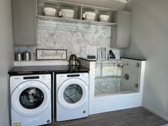 a washer and dryer in a small room