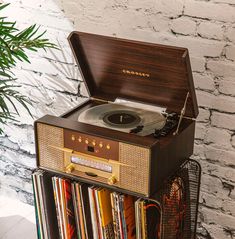 a record player sitting on top of a rack