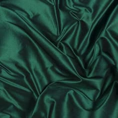 the green fabric is very soft and shiny