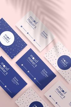 six business cards mock up on a pink background with blue and white dots in the middle