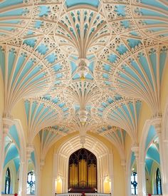 the interior of a church with blue and white ceilings