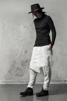 "Off-White Drop Crotch Boiled Linen Trousers with Buttons__ // EXPRESS DELIVERY ONLY __Semi Visible Front Closure with Black Buttons __3 Front & 2 Back Pockets __Fully Completed Bound Seams __Elastic Backside Waistband model__ bust 92 (36\"), waist 72 (28\"), hips 102 (40\"), biceps 28 (11''), height 177 (5'8\"), kg 65 (143 lbs) model wears size M | color: off-white fabric__ 100 linen care__ dry cleaning do not bleach do not tumble dry do not iron to keep wrinkle effect sizing__ size XS (US Fitted White Harem Pants With Pockets, Brogues Outfit, Low Crotch Pants, Off White Pants, Winter Trousers, Minimalist Shirts, Pants Linen, Drop Crotch Pants, Black Blouse Long Sleeve