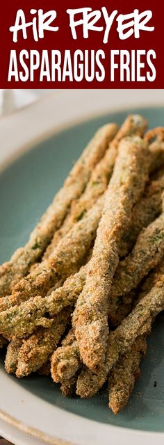 air fryer asparagus fries on a plate with text overlay that reads, air fryer asparagus fries