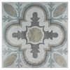 an intricately designed tile pattern in grey and white colors, with the center cross at the top