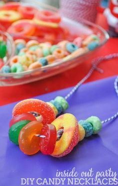 colorful candy beads are on a purple table