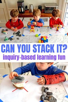 two boys sitting at a table playing with legos and paper on the table that says can you stack it?