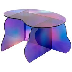 a table that has been designed to look like an abstract piece of art with blue and purple