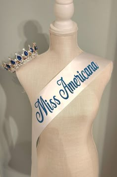 the miss america sash is displayed on a mannequin