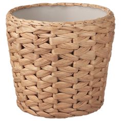 a large woven basket is shown on a white background and it's light brown color