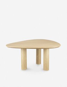 an oval wooden table with two legs on the top and one leg raised up to the ground