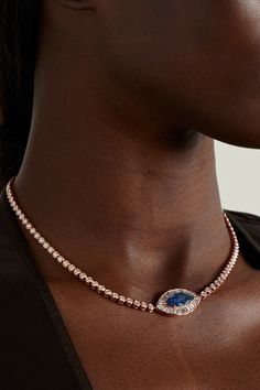 Anita Ko's necklace is modeled on classic tennis styles, which makes it endlessly wearable and timeless. It's cast from 18-karat rose gold and set with round-cut diamonds along the chain and baguette-cut ones at the pendant, framing a vibrant blue sapphire - the charm is meant to depict an evil eye, a talisman of protection against negativity. Formal Fine Jewelry Rose Gold Tennis Necklace, Rose Gold Diamond Cut Tennis Necklace, Luxury Rose Gold Tennis Necklace For Formal Occasions, Luxury Rose Gold Tennis Necklace With Diamond Accents, Elegant Rose Gold Necklaces With Diamond Eyes, Luxury Single Strand Tennis Necklace, Diamond And Sapphire Necklace, Sapphire Necklace Gold, Anita Ko Jewelry