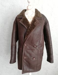 "Vintage Brown Double Buttoned Real Shearling Sheepskin Leather Casual Coat Men Outside of the jacket it is leather finish, and on the inside, there is a very smooth, supple, and warm thick sheepskin wool PETROFF Real Sheepskin Winter Brown Coat Men's genuine hip length sheepskin jacket It has a three button fastening, a notched collar, 2 outer pockets. This winter sheepskin coat is warm and soft. * PETROFF * Size on tag: Medium Approx fit Small ( Maneken size is M) * Genuine Sheepskin Leather * Brown Rugged Sheepskin Leather Jacket, Rugged Brown Sheepskin Outerwear, Brown Leather Jacket With Leather Lining For Winter, Vintage Leather Fur Coat With Faux Fur Lining, Leather Fur Coat With Faux Fur Lining, Rugged Winter Outerwear With Leather Lining, Brown Leather Long Fur Coat, Brown Sheepskin Leather Jacket With Long Sleeves, Brown Long Sleeve Sheepskin Leather Jacket