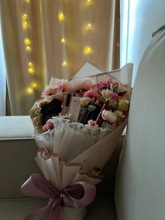 a bouquet of flowers sitting on top of a counter