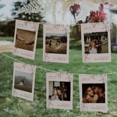 polaroid photos hanging on a string in the grass