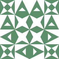 a green and white pattern with triangles