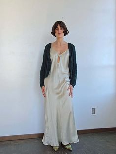 Pale green maxi slip dress. bias cut with adjustable straps. low cut bacl and a frog button detail at the chest.    measurements (in inches)    42 in bust    36 in waist    50 in hips    ~56 in length    materials    silk White Slip Dress Vintage, Slip Dress Vintage, Vintage Slip Dress, Vintage Slips, Green Maxi, A Frog, Maxi Slip Dress, Pale Green, Button Detail