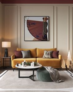 a living room with a yellow couch and coffee table in front of a painting on the wall