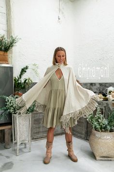 Spring Vacation Bohemian Shawl, Bohemian Beige Shawl For Spring, Bohemian Cream Poncho With Fringe, Beige Bohemian Shawl Poncho, Bohemian Beige Outerwear With Tassels, Beige One Size Bohemian Poncho, One Size Beige Bohemian Poncho, Beige Bohemian Shawl For Festivals, Bohemian Beige Poncho Cape