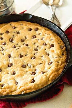 a chocolate chip cookie in a cast iron skillet