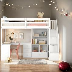 a white loft bed with desk and stairs in a room decorated for christmas or new year's eve