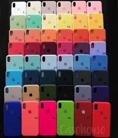 many different colored cases are stacked up in a row on a black background with the same color for each case