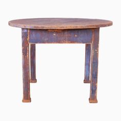 an old wooden table with two legs and a small round top, on a white background