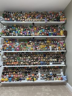 the shelves are filled with many different types of action figures