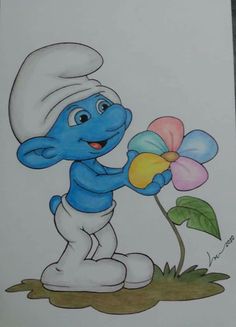 the smurf is holding a flower in his hand