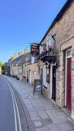 a street lined with stone buildings next to each other