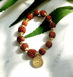 Here's a detailed description for 5 Mukhi Rudraksha bracelets : bead sizes: 10.5mm/ 6.5mm/ 4.5mm (please choose your bead size before place the order) Product Description: 5 Mukhi Genuine Rudraksha Bracelets for Men and Women Embrace the spiritual power of nature with our 5 Mukhi Genuine Rudraksha Bracelets, crafted for both men and women. These bracelets are designed for everyday wear, blending ancient traditions with modern style. Each bracelet is made from authentic 5 Mukhi Rudraksha beads,making them perfect for daily use. Features:  Authentic 5 Mukhi Rudraksha Beads: Sourced from reputable suppliers,Elegant Design for Everyday Wear: The bracelets are crafted to suit everyday attire, offering a stylish yet subtle way to incorporate spiritual elements into your daily life.  Adjustable S 5 Mukhi Rudraksha, Rudraksha Bracelet, Bracelets Bead, Gender Neutral Style, Rudraksha Beads, Bead Sizes, Power Of Nature, Spiritual Power, Stretch Band