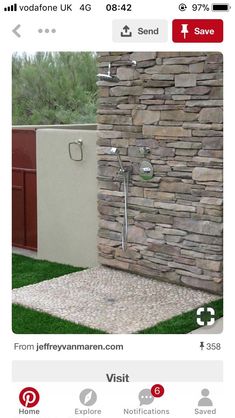 an image of a stone shower in the yard