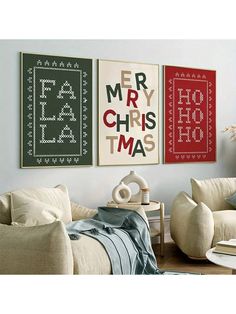 three christmas cards hanging on the wall in a living room