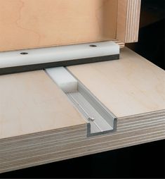 a piece of plywood is being used to build a cabinet door with the sliding mechanism