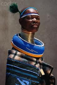 Ndebele Belle Neck Rings. Both men and women wear them. They are stiff in nature and have evolved from the torc, worn by ancient Celts and those in the European Iron Age, where they were worn as a status of wealth. The other type is more like a coil, that is worn by women. In some African and Asian cultures, next rings are worn to strictly create an appearance that the neck has been stretched. Trail Walking, Costume Africain, North Cyprus, Apple Pies, Accra