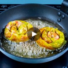 some food is cooking in a pan on the stove