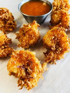 fried food with dipping sauce on the side