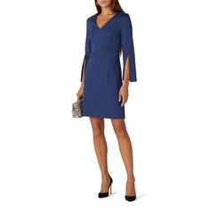 Blue ponte (69% Rayon, 29% Nylon, 2% Spandex). Sheath. Long sleeves. V-neckline. Hidden center back zipper closure. Fully lined. 38" from shoulder to hemline. Imported. Bouquet Dress, Trina Turk Dresses, Blue Bouquet, Rent The Runway, Trina Turk, Closet Designs, Blue Dresses, Cold Shoulder Dress, Dresses For Work