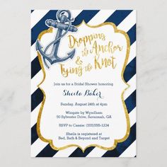 an anchor is on the front of this navy and white striped baby shower