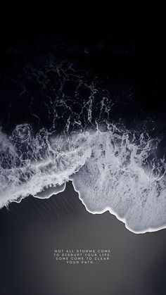 an aerial view of the ocean and waves with a quote written in white on it